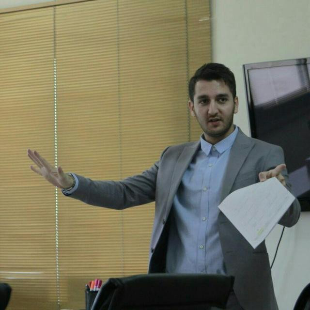 علی آموزگار